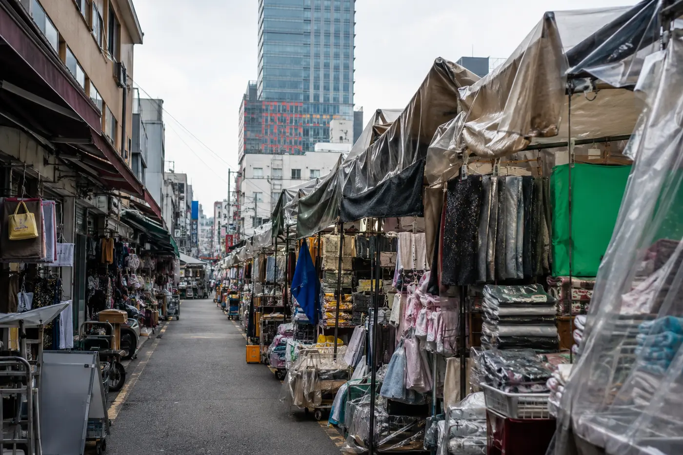 A realistic mix of Seoul budget retail from tidy value store to dense market