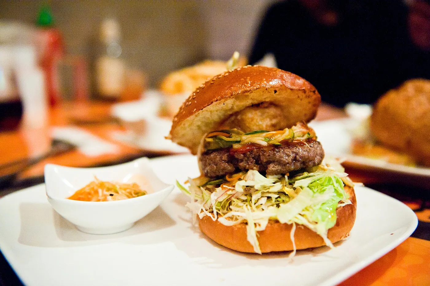 A Korean-style bulgogi burger on a fast-food tray