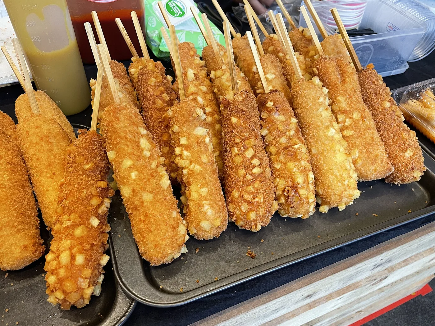 A crisp Korean corn dog with a melted cheese center