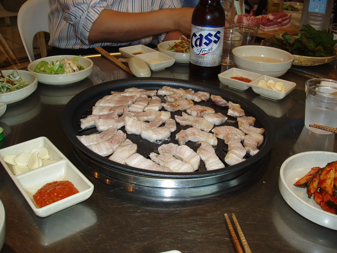 Two portions of raw pork ready for a Korean barbecue meal