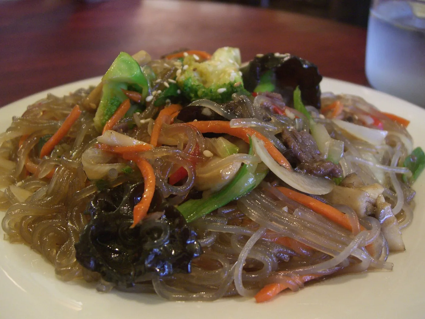 Japchae glass noodles stir-fried with vegetables and mushrooms