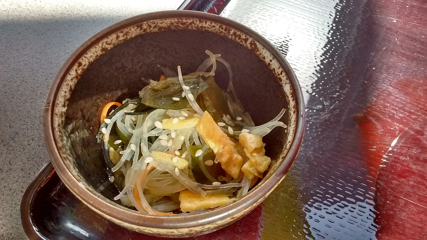 Japchae glass noodles stir-fried with vegetables and mushrooms