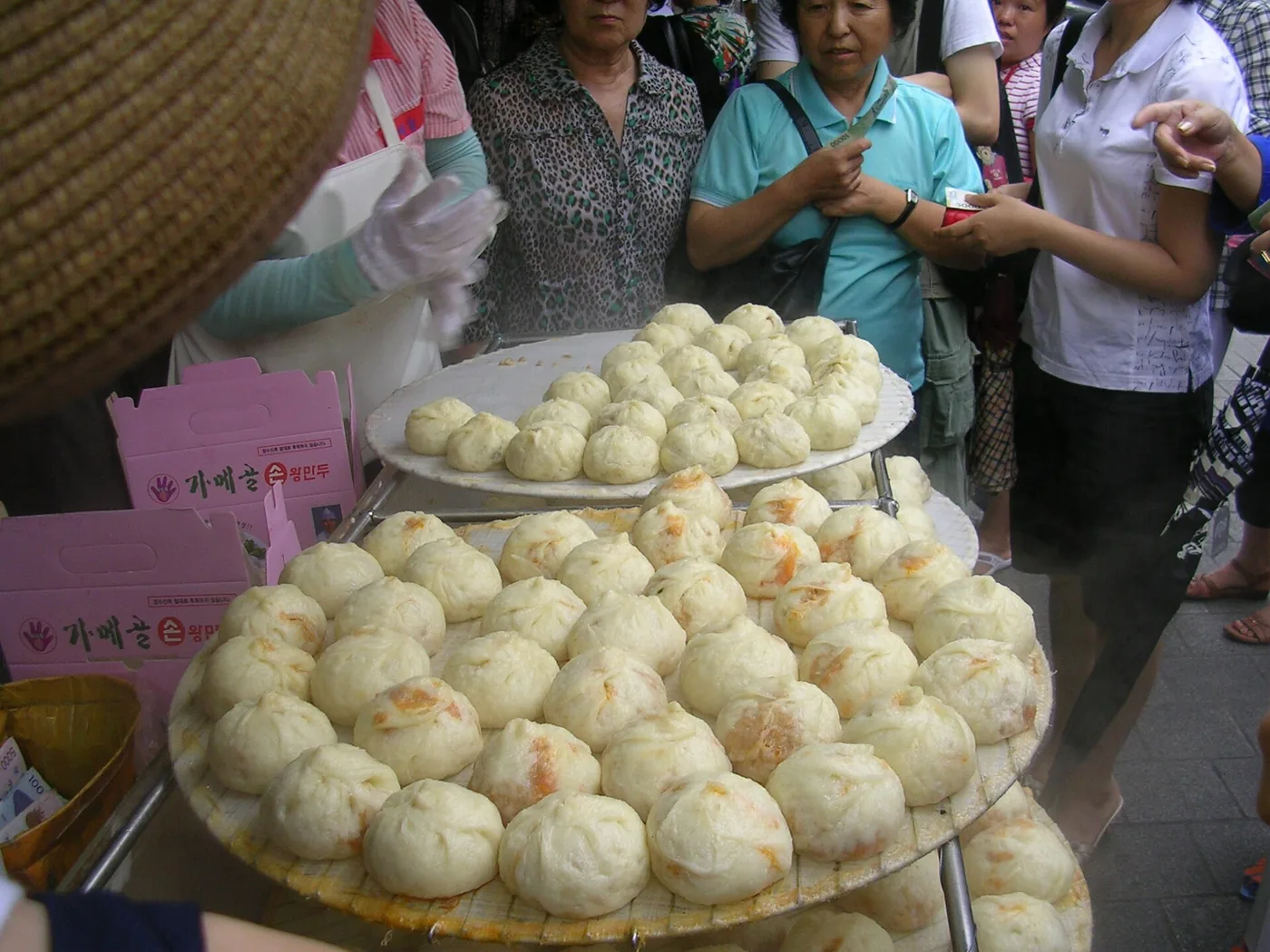 A tray of steamed Korean mandu dumplings