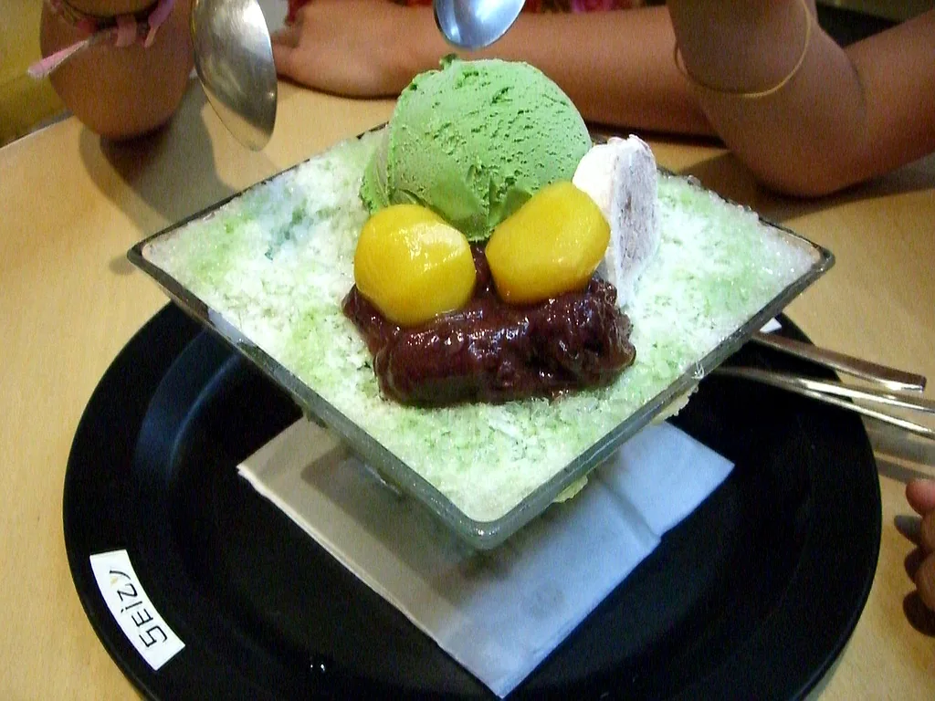 Patbingsu shaved ice topped with sweet red bean and rice cake