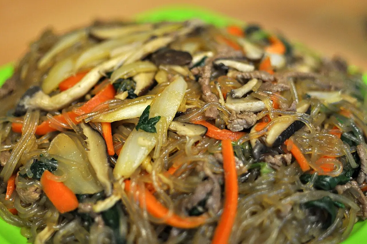 Japchae glass noodles stir-fried with vegetables and mushrooms