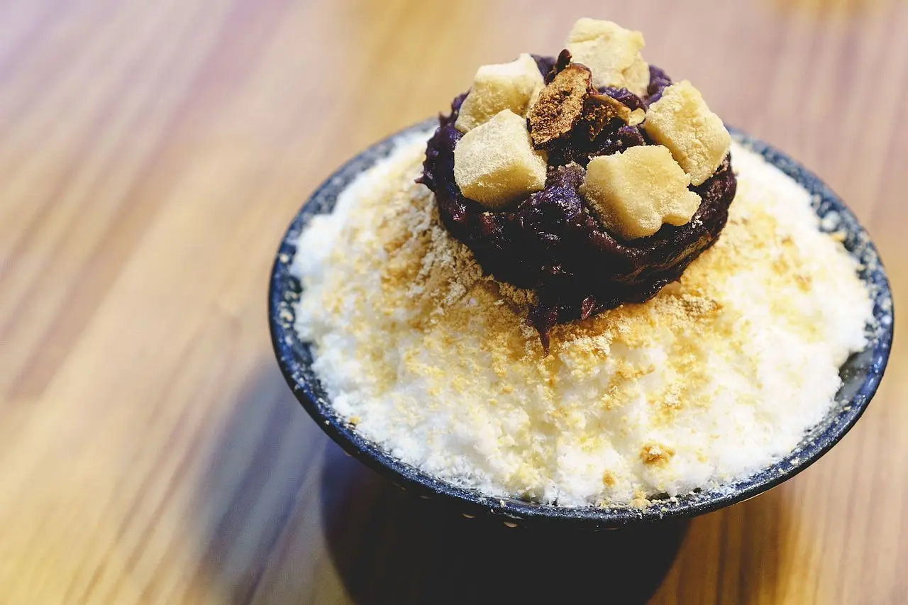 Patbingsu shaved ice topped with sweet red bean and rice cake