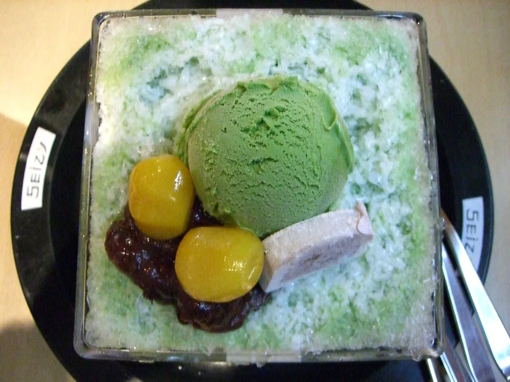 Patbingsu shaved ice topped with sweet red bean and rice cake