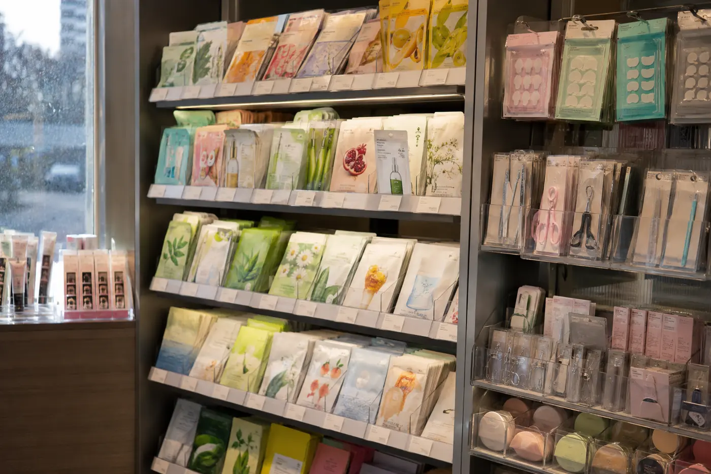 Sheet masks, pimple patches and compact beauty tools in distinct displays