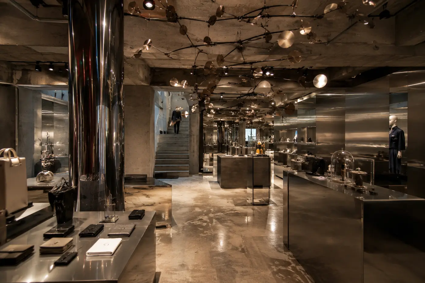 Kinetic art and polished metal displays inside an avant-garde Dosan concept store