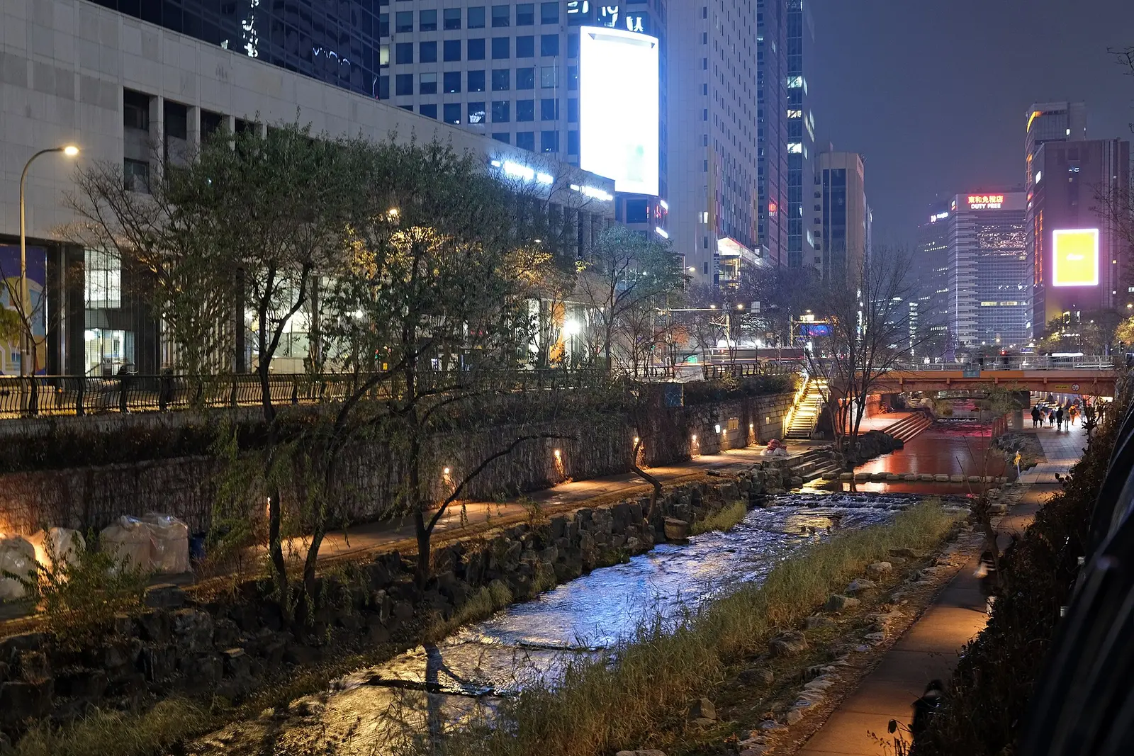 Cheonggyecheon lit below the streets of central Seoul