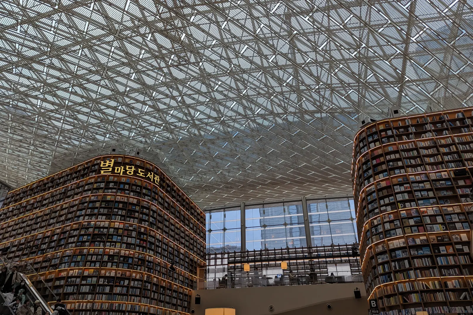 Visitors inside Starfield Library at COEX Mall