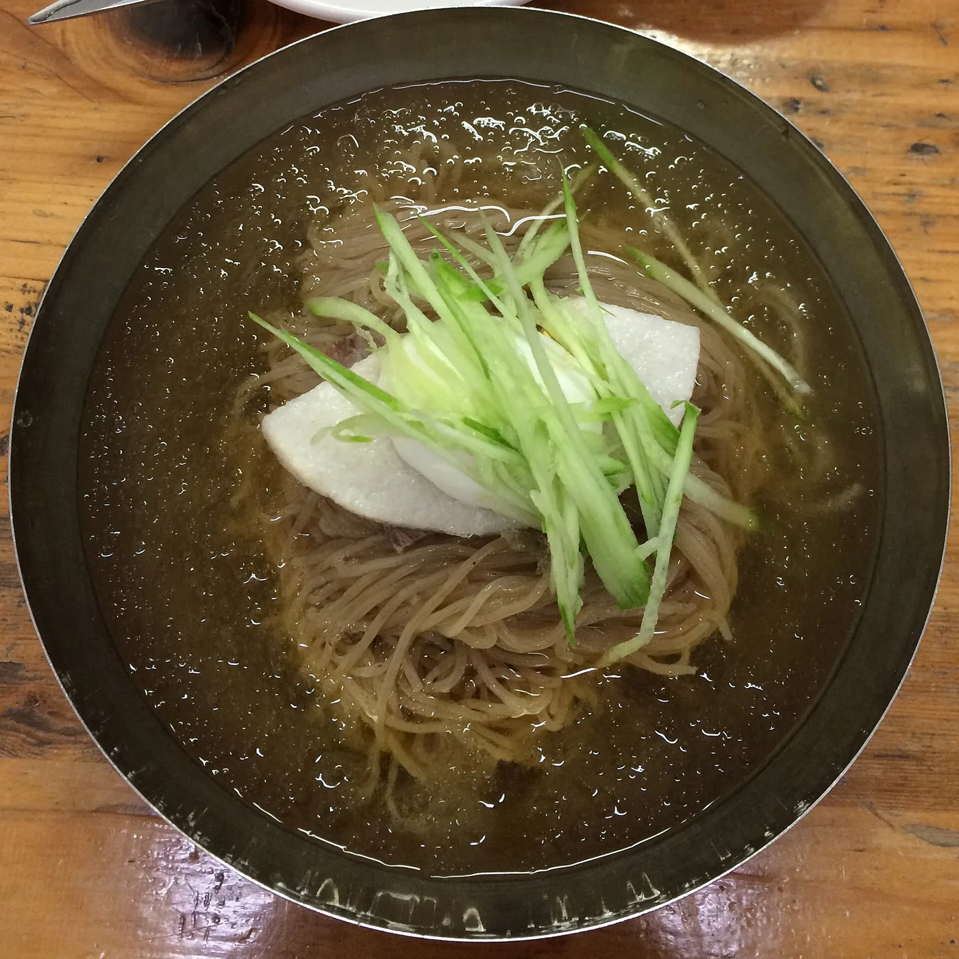 Mul naengmyeon with buckwheat noodles in a chilled broth