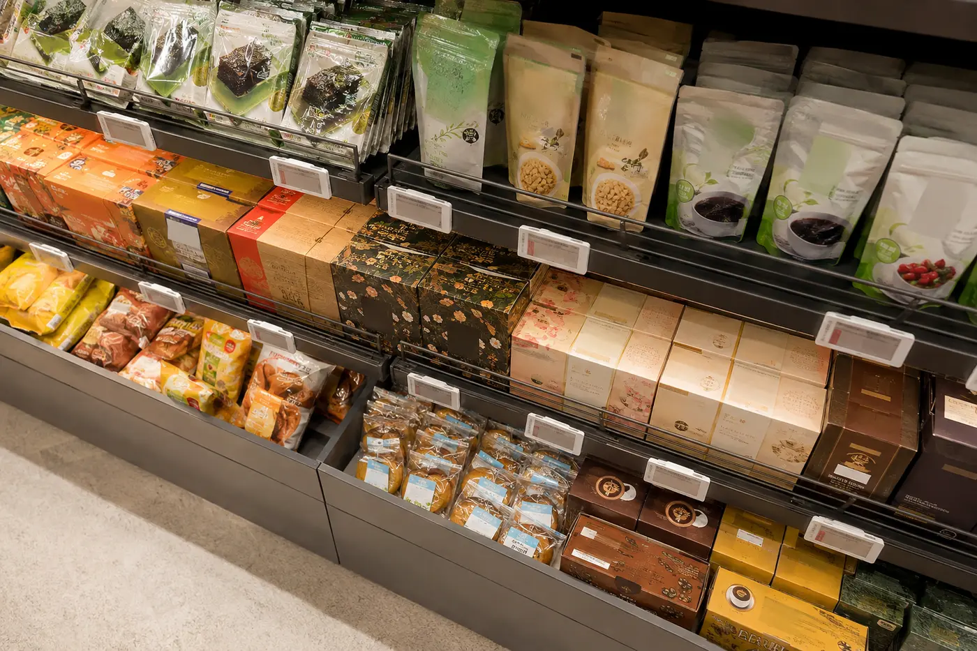 Packable Korean seaweed, tea, coffee and sealed snacks on a supermarket shelf